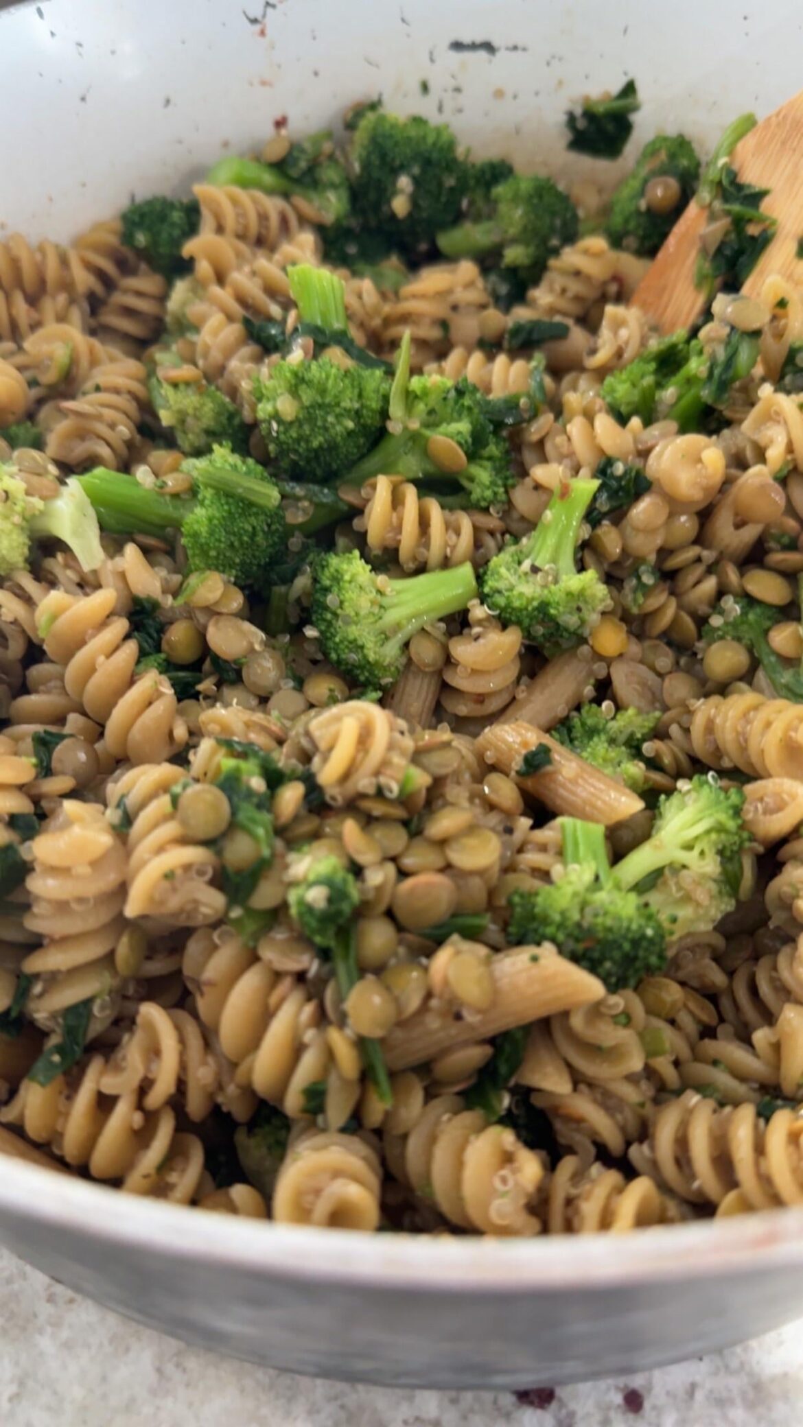 Pasta, lentils, quinoa, broccoli, spinach, salt, black pepper, red pepper, and nooch