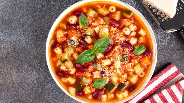 Bowl of minestrone soup on counter