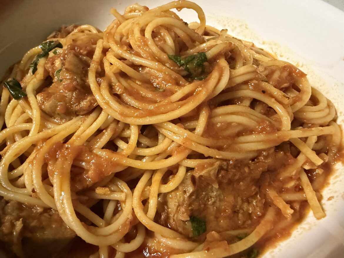 Spaghetti in a spicy tomato sauce with Italian sausage
