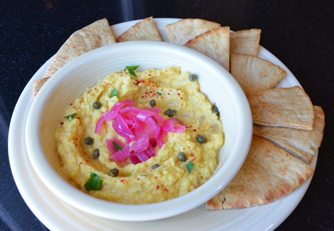 (383 cal, 27 g protein) Pitas and Greek Fava Dip topped with pickled onion and capers