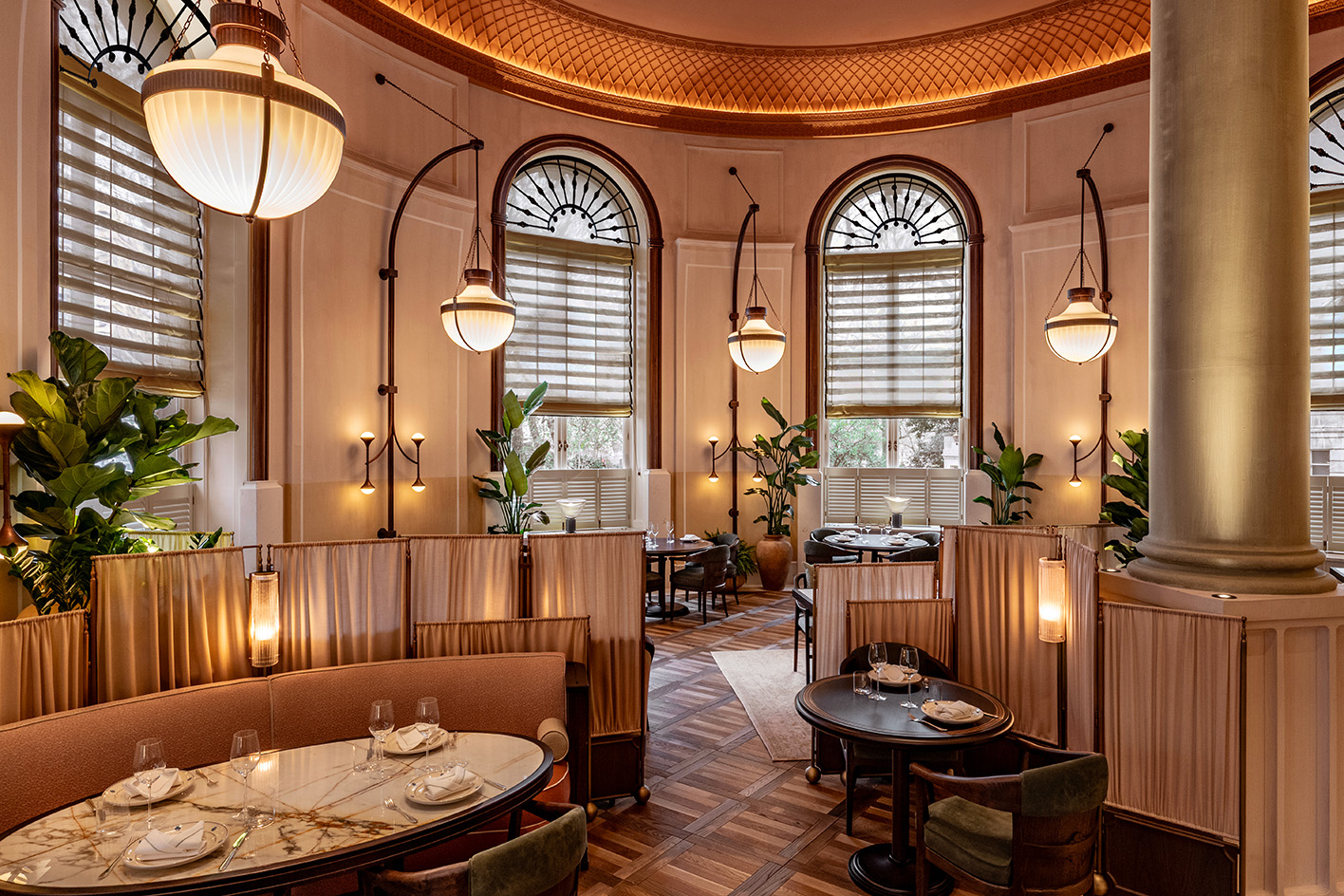 interior of Mezzogiorno by Afroditi in moody light and warm red and brown tones