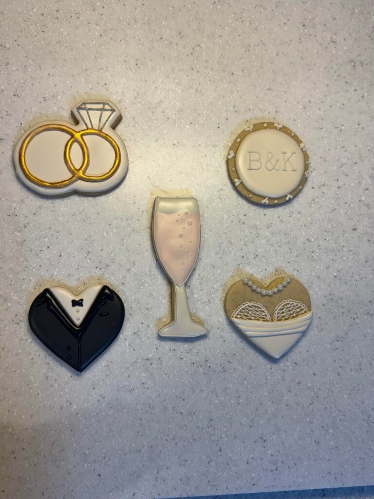 Daughter’s bff getting married. Labor of love, here. 50 in and there’s 3 more designs I haven’t started yet. Due Feb 4. I sure hope they freeze like yall said they will!! Please, cookie gods, treat me right.