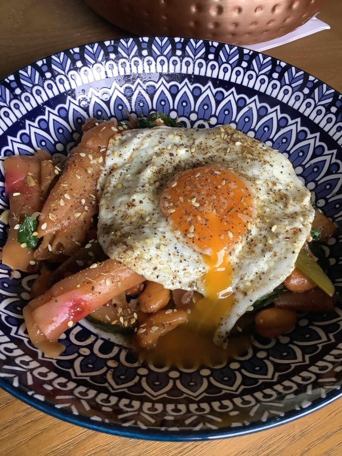 Leftover veggie chow fun with cashews, a sunny and Za’atar.