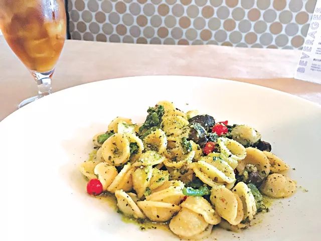 Orecchiette is served with salsa verde and seasonal vegetables, including Peruvian teardrop peppers. (Photo Jacob Threadgill)
