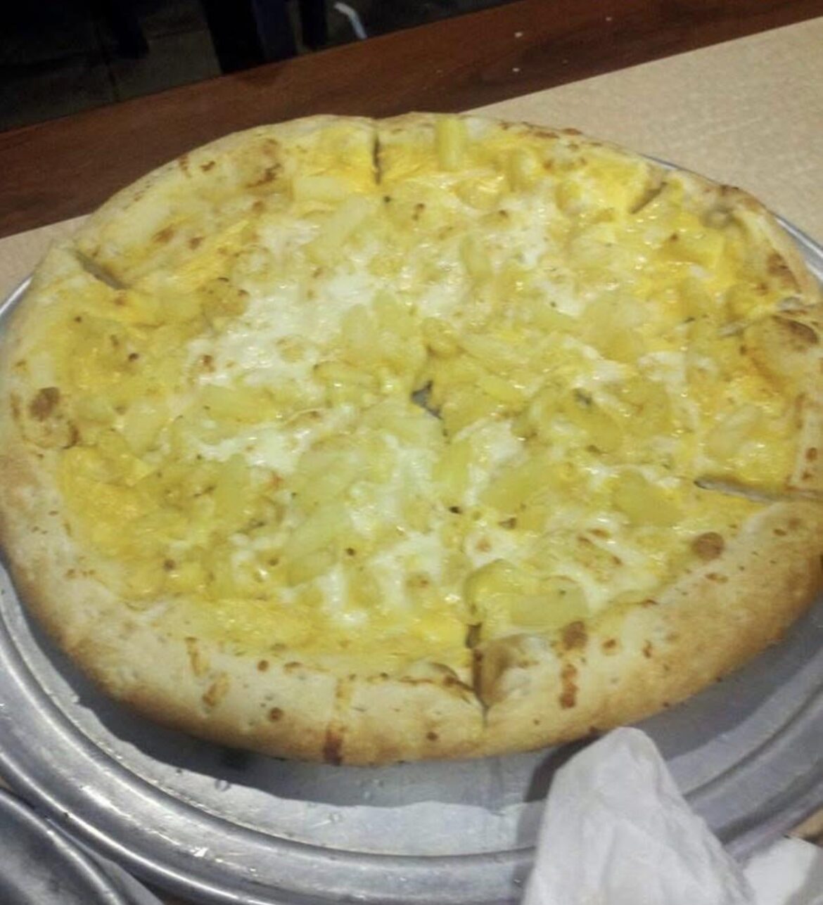 Macaroni pizza with Pineapple. Don’t knock it until you try it.