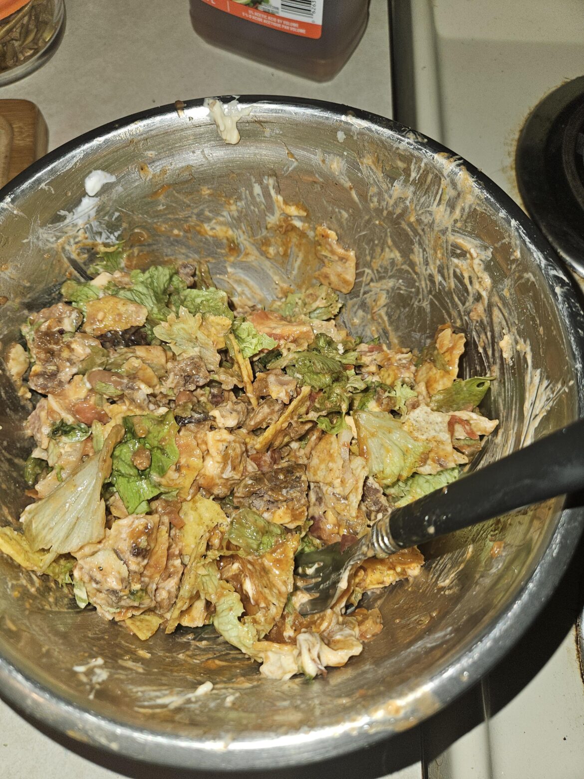 Like four 4 day old wendys burgers, mixed with wendys taco salad, some crackers, hot sauce, and French onion dip. (Bread was used for toasts this morning.)