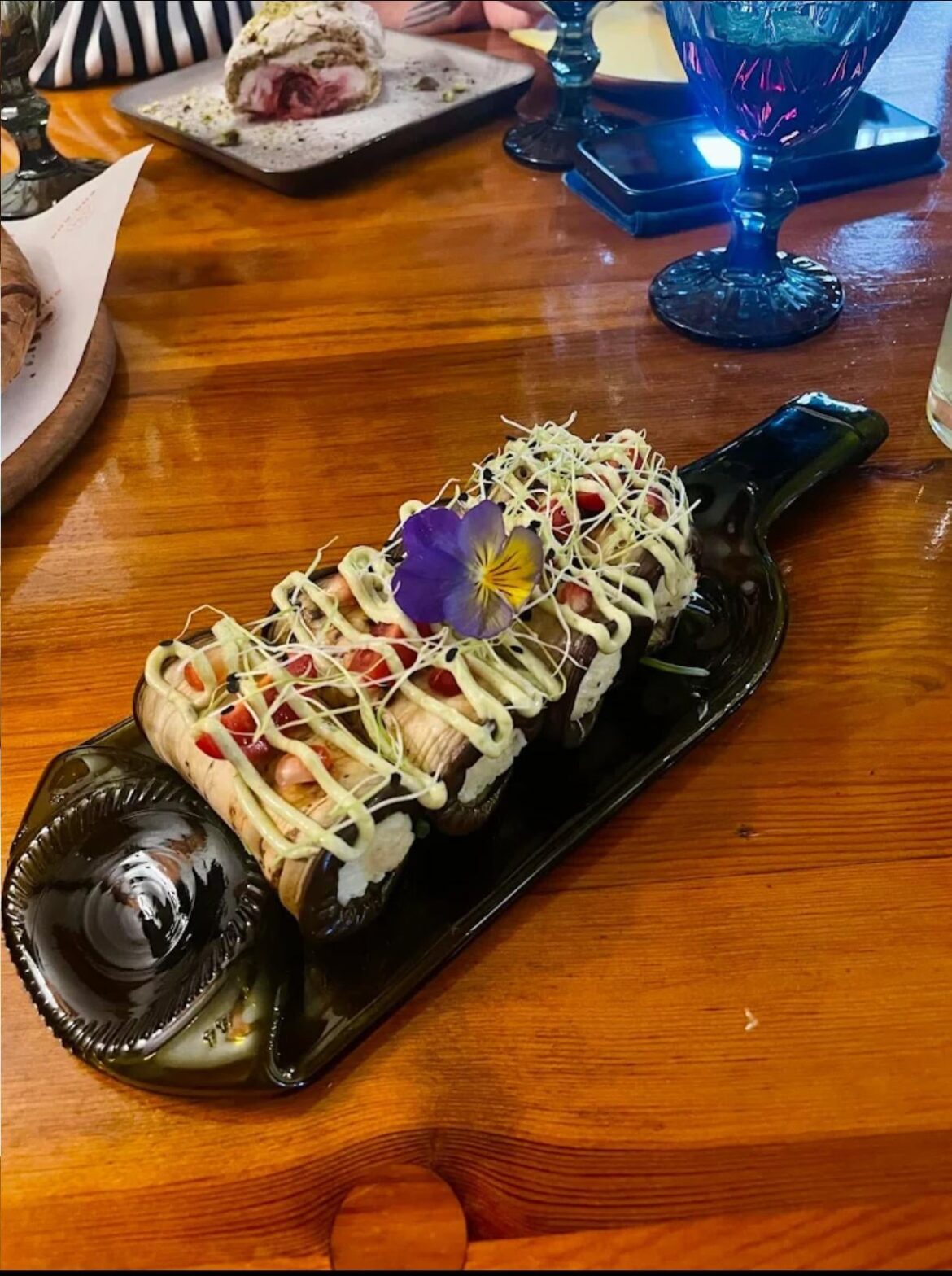 I'm usually quite lenient, but I just do not understand these badrijani on a flattened bottle I found in a review on Google Maps