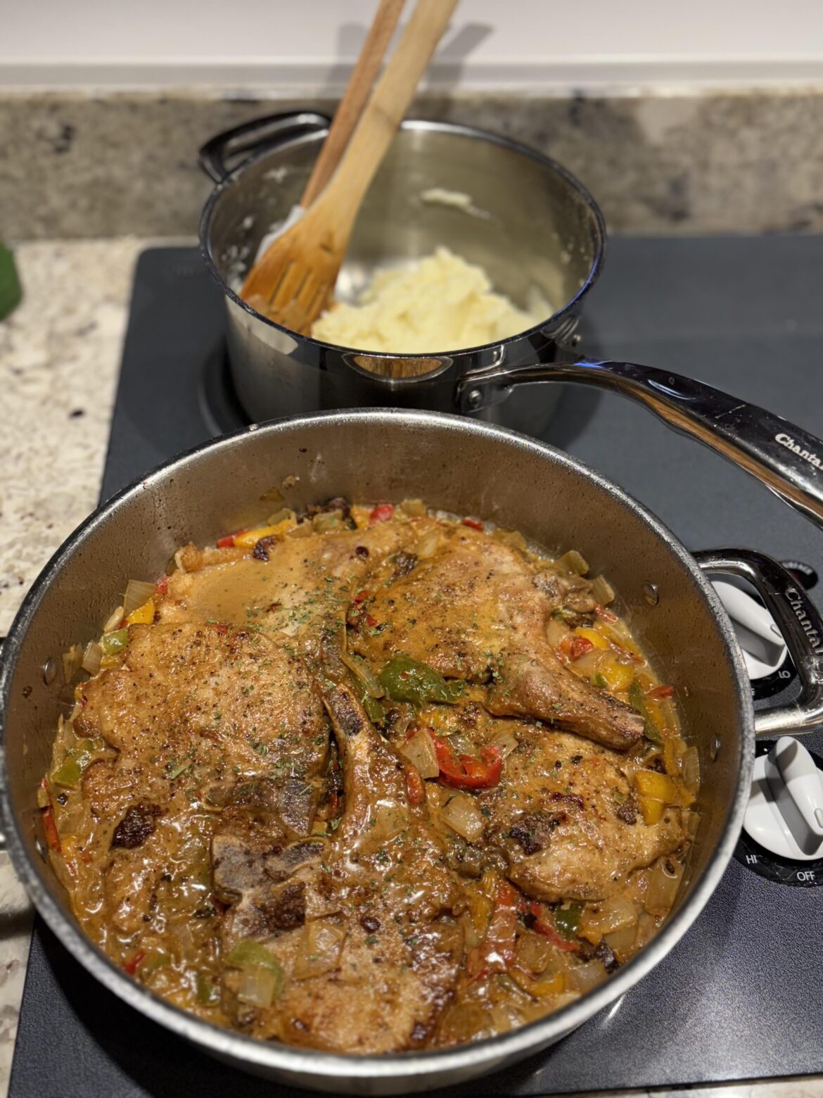 Smothered pork chops and mashed potatoes