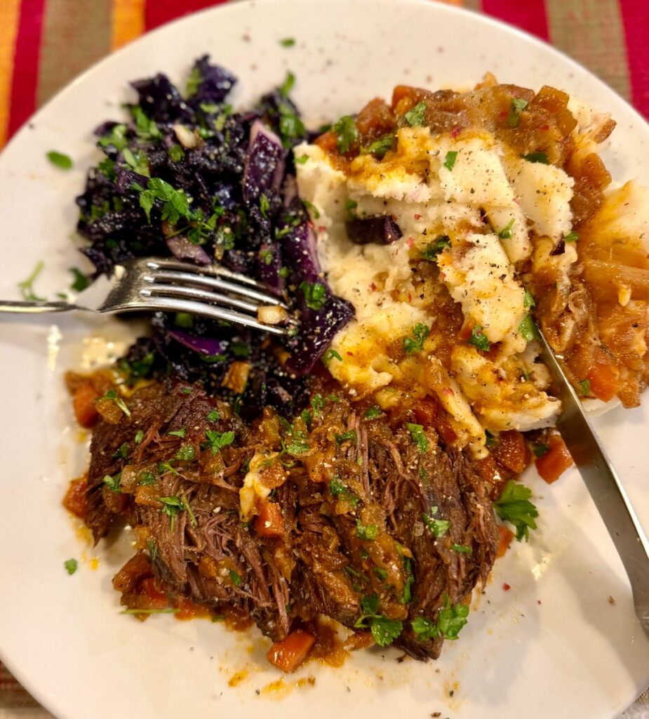 I was today years old that I learned that duck-fat mashed potatoes are a thing! With boneless beef short ribs and red cabbage. The mash is enhanced with parmigiana and horseradish! Steamed ginger pudding for dessert!
