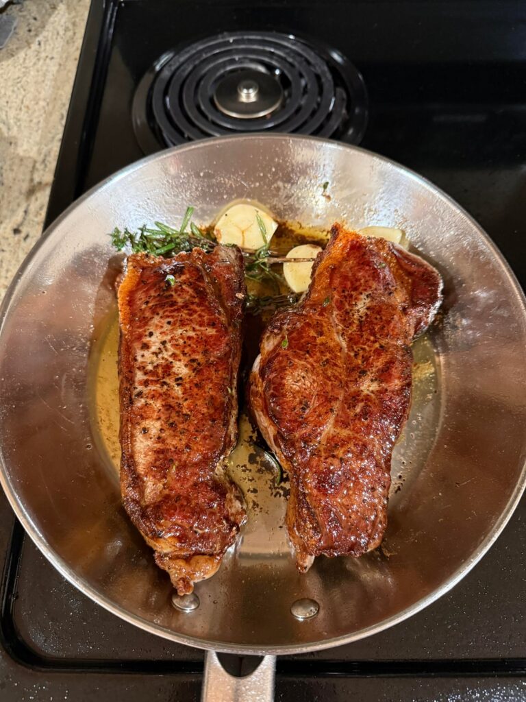 NY Strips on Stainless Steel