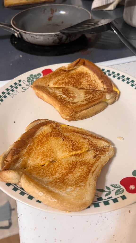 Humble grilled cheeses using Kraft Singles. (Recipe and review below)