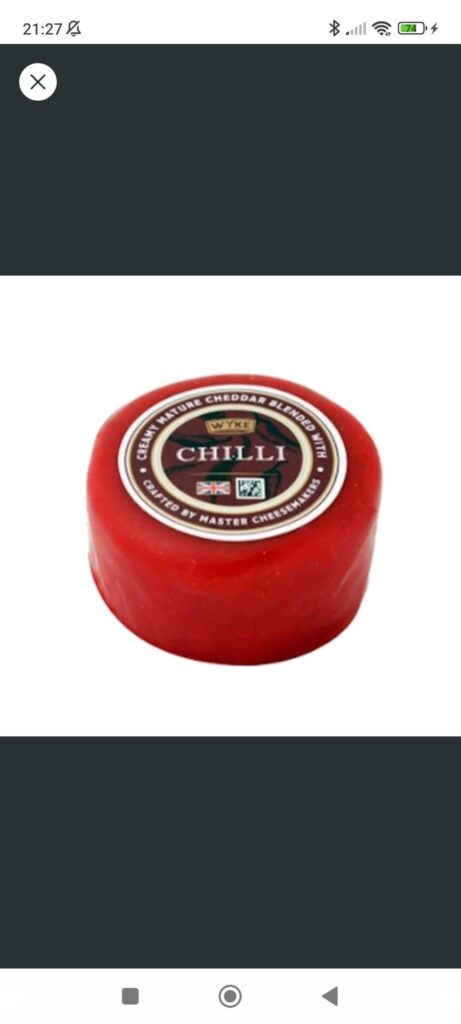 waxed cheese on a charcuterie board