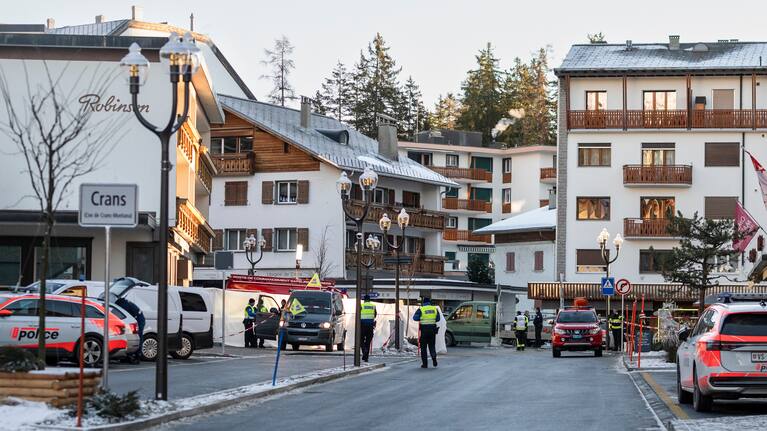 Police officers inspect the area where a fire broke out at the Le Constellation bar and lounge leaving people dead and injured, during New Year’s celebration, in Crans-Montana, Swiss Alps, Switzerland.