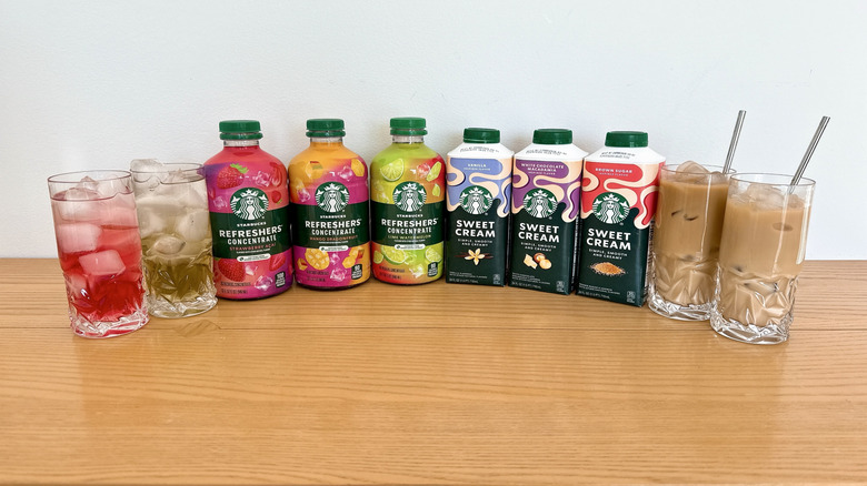 Bottles of Starbucks refreshers concentrates and sweet cream refreshers