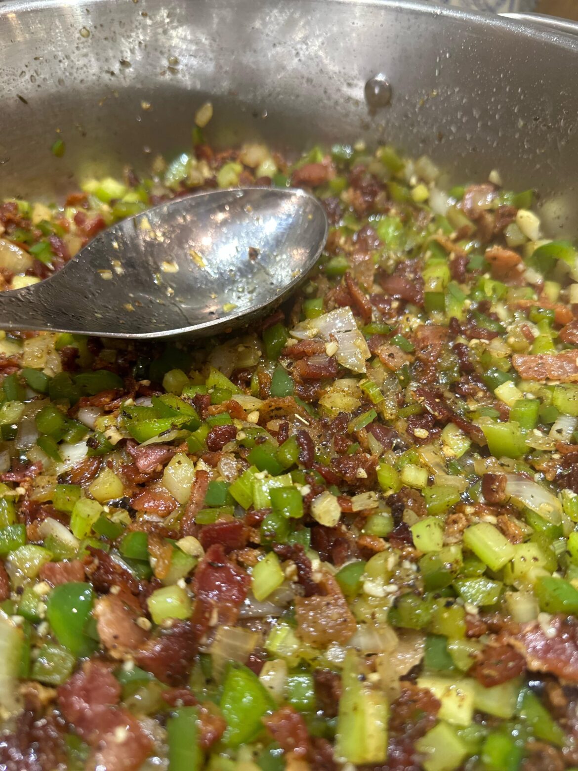 I have bacon, onion, celery, green pepper, garlic, salt, and pepper, and thyme in my pot. What should I make?