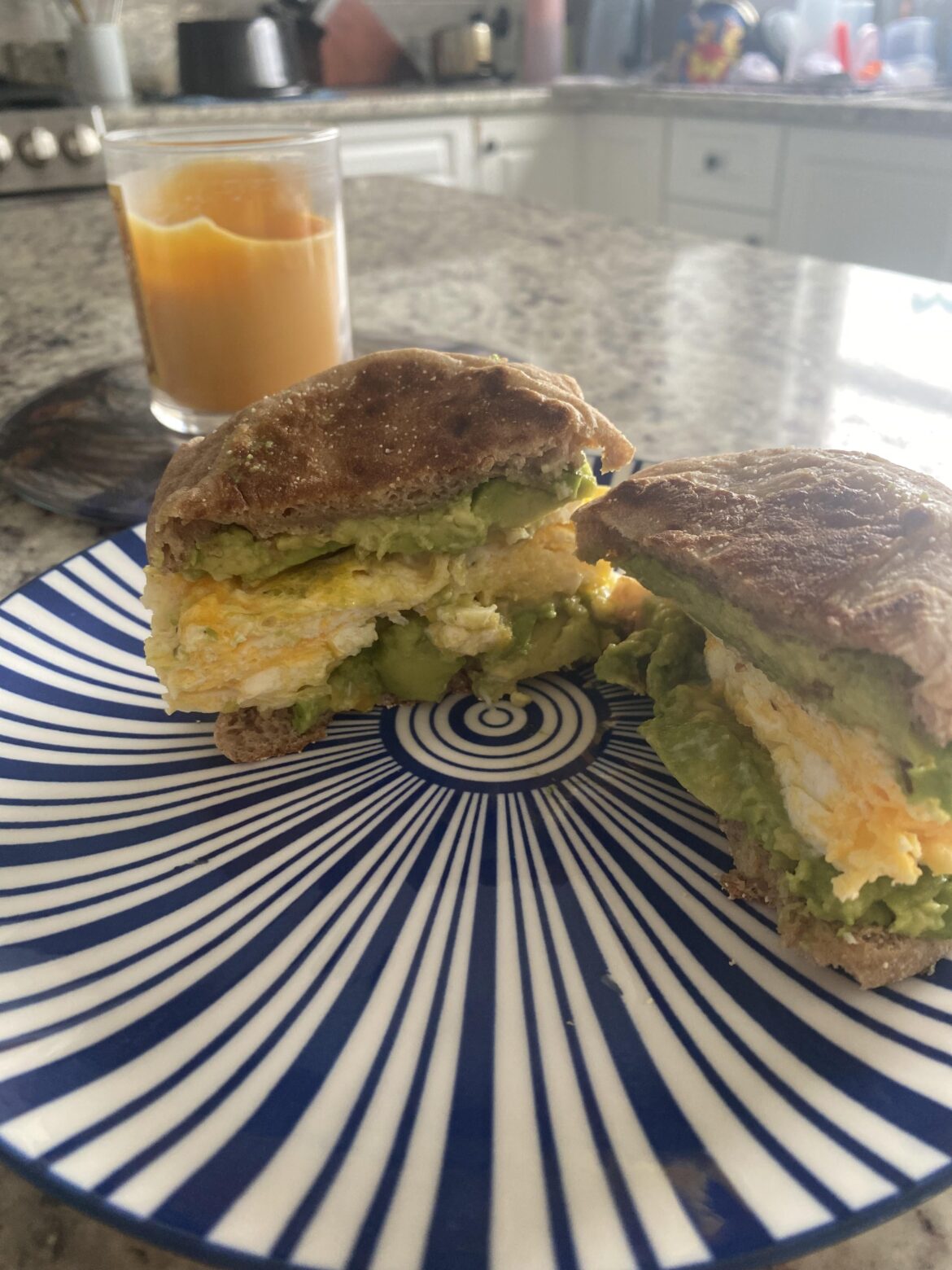 Cheesy Egg on an English muffin with Avocado spread