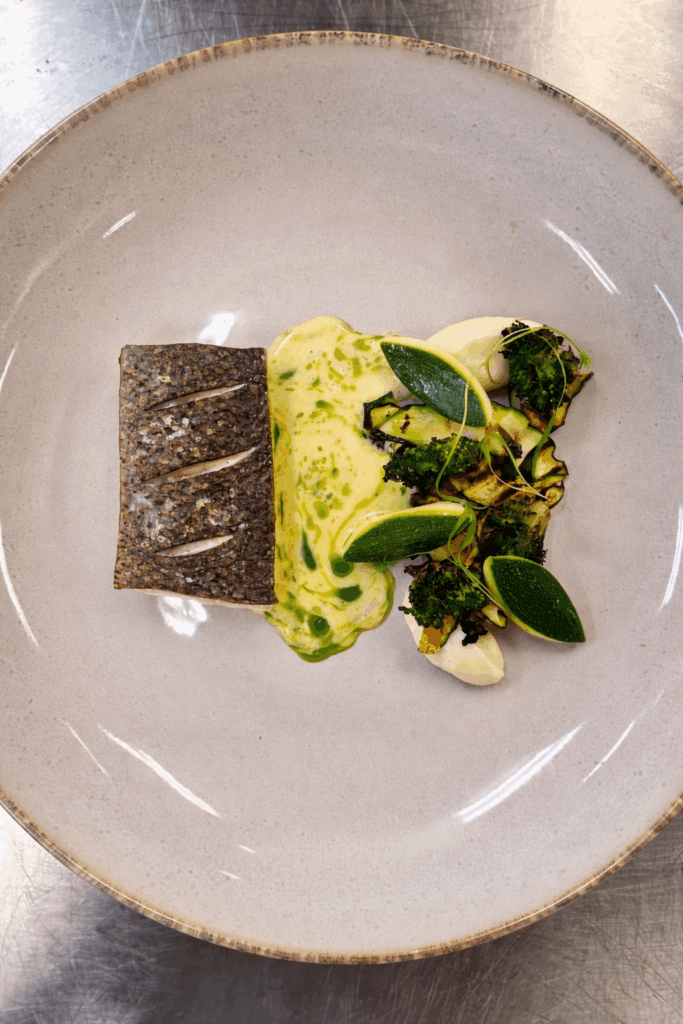 Oven roasted salmon,charred brocoli and courgette,turned courgette,celeriac pure and split bure blanc sauce