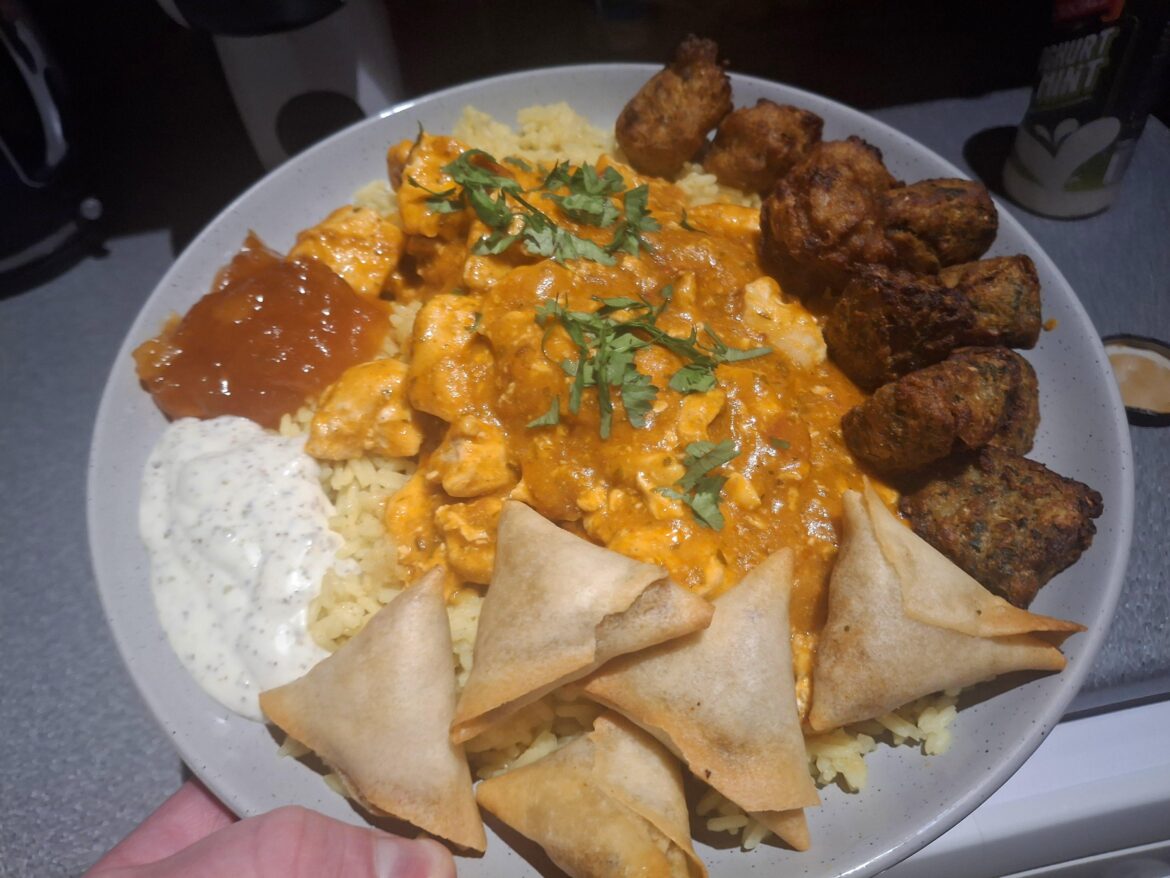 Home made butter chicken with not home made sides !