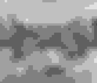 Intérieur du restaurant Le Jules Verne avec baies vitrées et vue sur les tours de La Défense