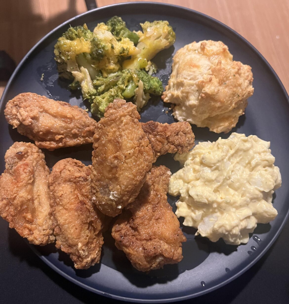 Lemon pepper chicken wings, broccoli w/cheese, red lobster biscuits and deviled egg potato salad