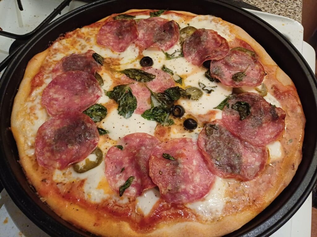 Using up some Christmas bits on a pre made pizza dough.