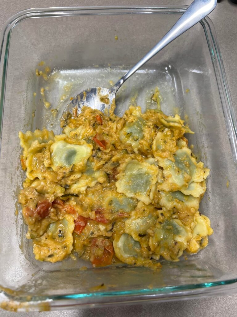 Zuchini, tomato, white bean parmesan sauce with ravioli