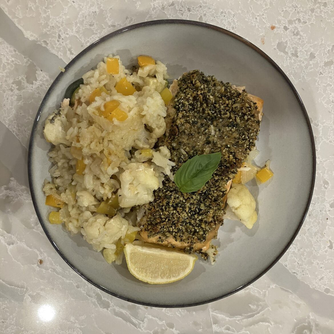 Herb crusted salmon with veggies and rice