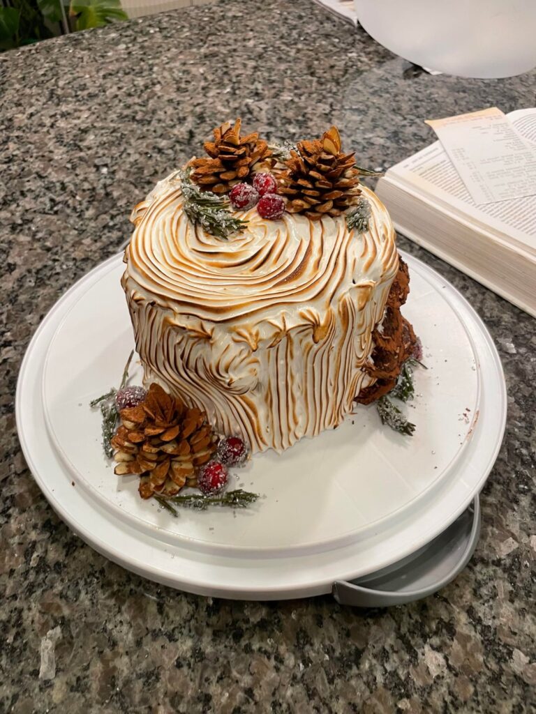 Inverted Red Velvet Bûche de Noël with a Toasted Swiss Meringue Case and Edible Pinecones Inverted Red Velvet Bûche de Noël with a Toasted Swiss Meringue Case and Edible Pinecones
