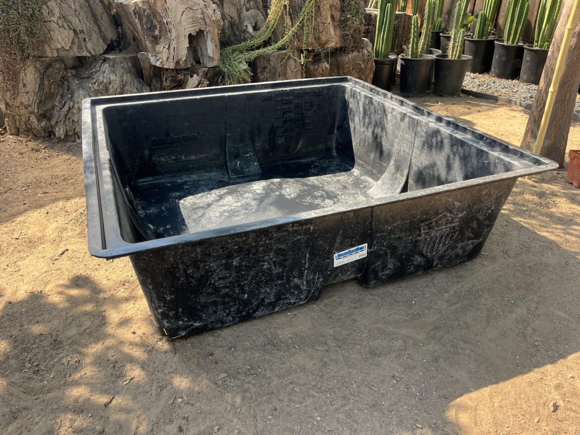 Plastic tub raised bed drainage