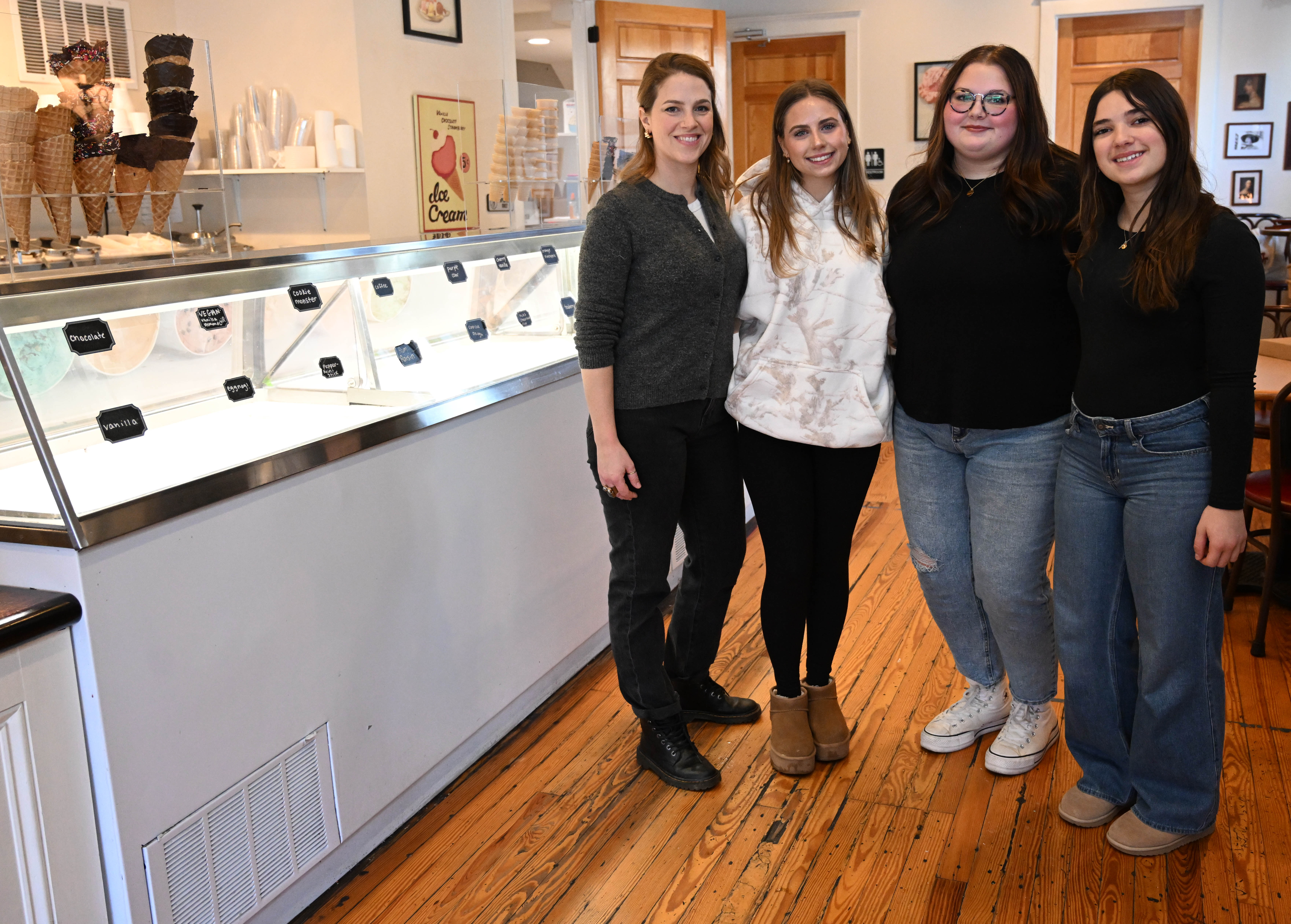 New Emily’s Ice Cream owner Mylea Biggiani, left, and staff...