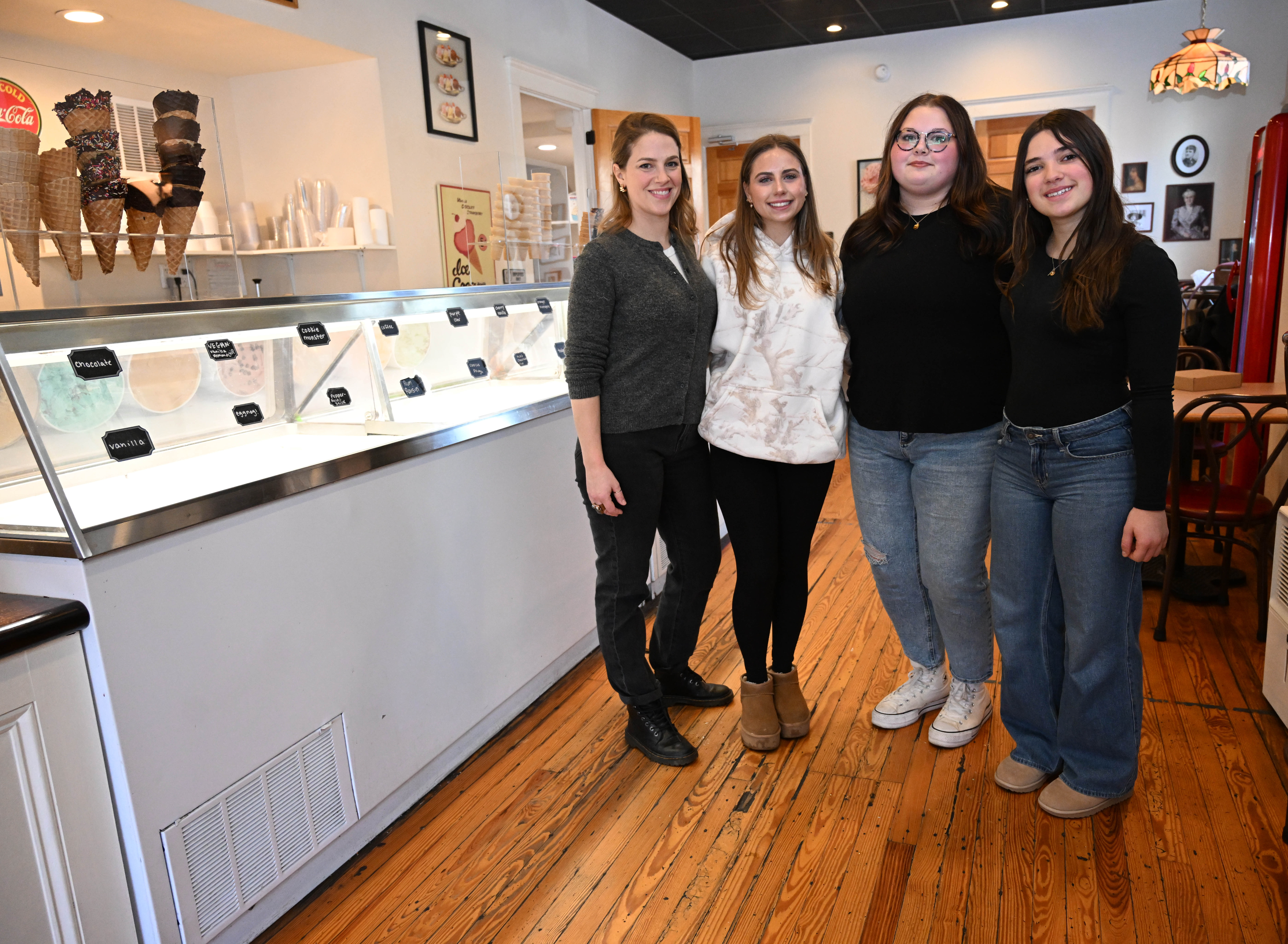 New Emily’s Ice Cream owner Mylea Biggiani, left, and staff...