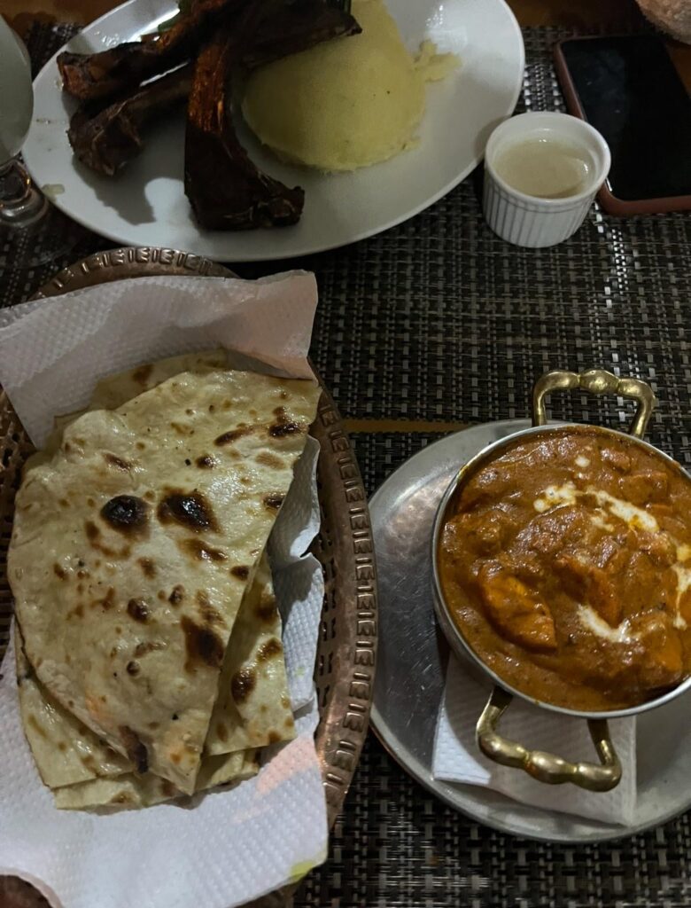 [homemade] butter chicken with naan and grilled meat
