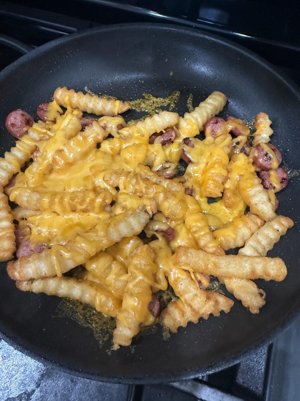 Hot dogs, fries, cheese.