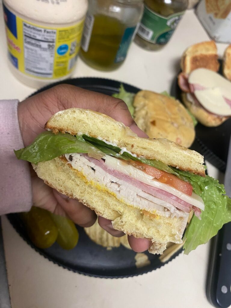 Turkey and ham sandwiches on onion rolls