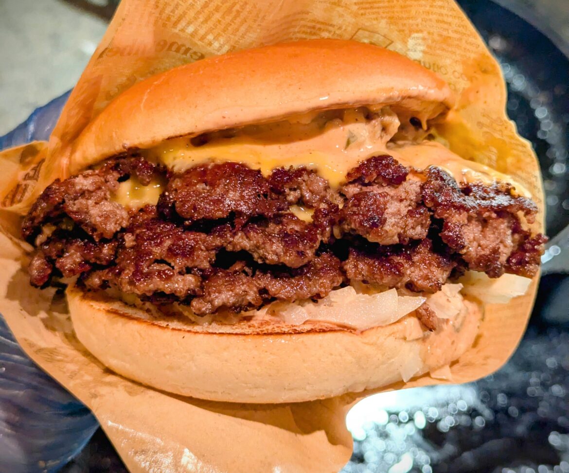 Triple brisket, triple American cheese, home made spice sauce and finely diced onion on toasted potato breads