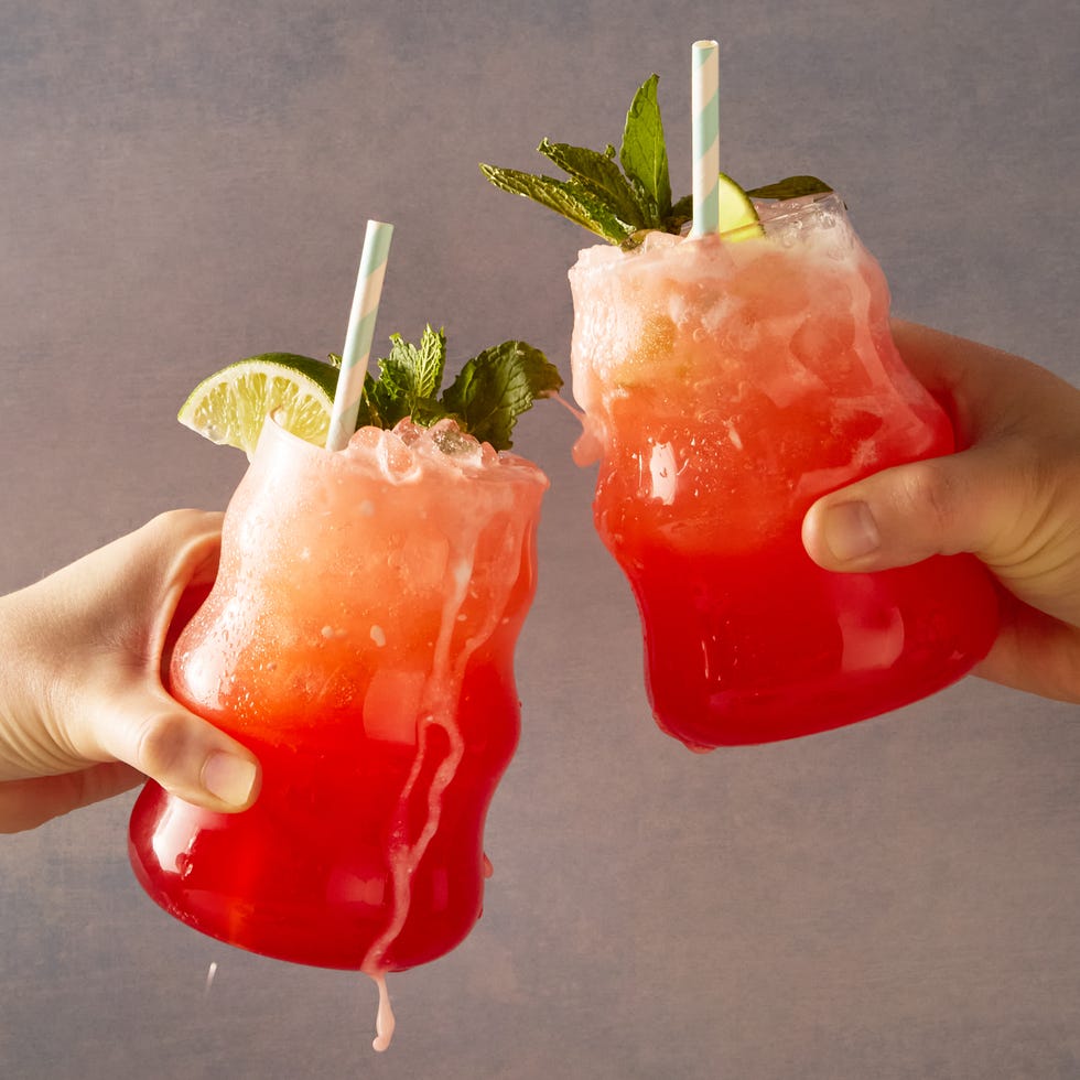 dirty soda with strawberry syrup, cream, and mint