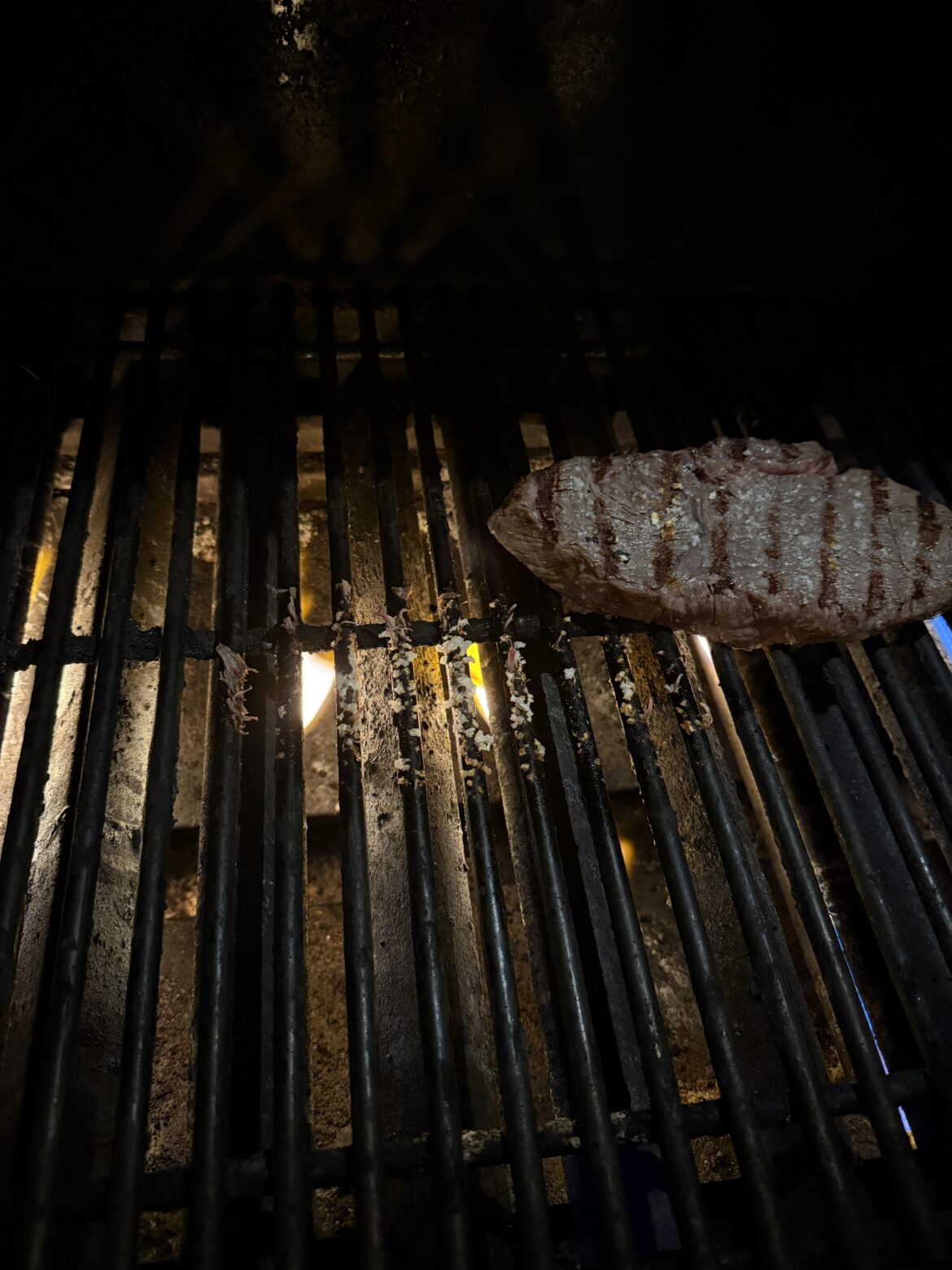 Why does my steak get stuck to the grates?