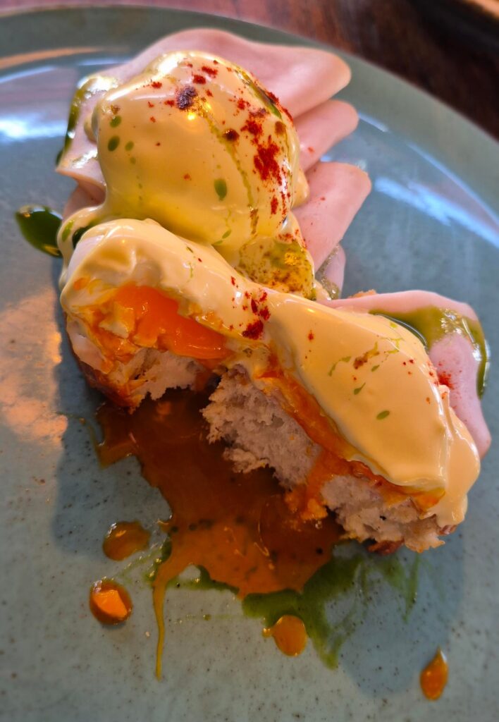 Eggs Benedict + French toast with vanilla cream and raspberries