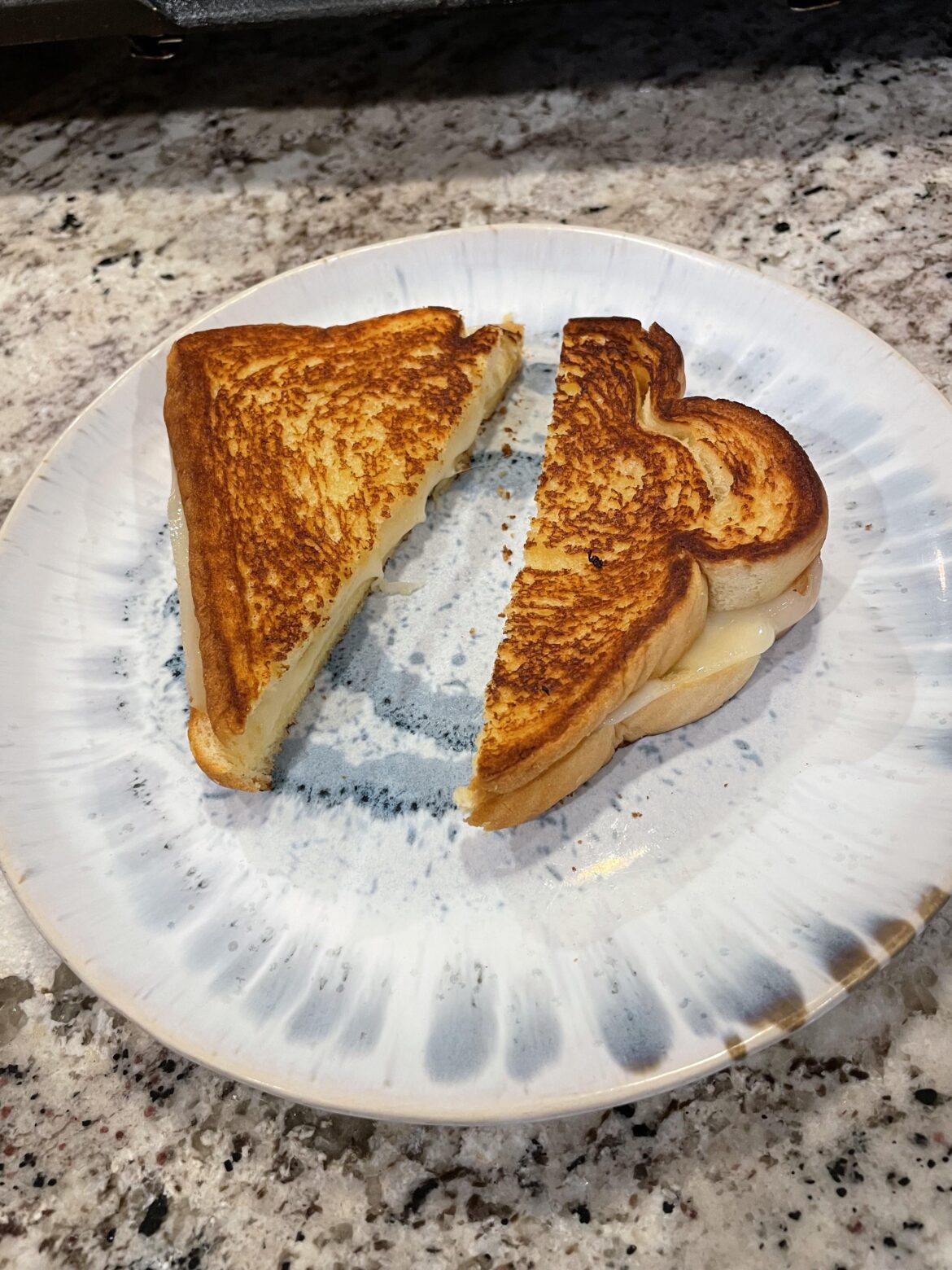 Post-breakup Grilled Cheese (Swiss on potato) 😞