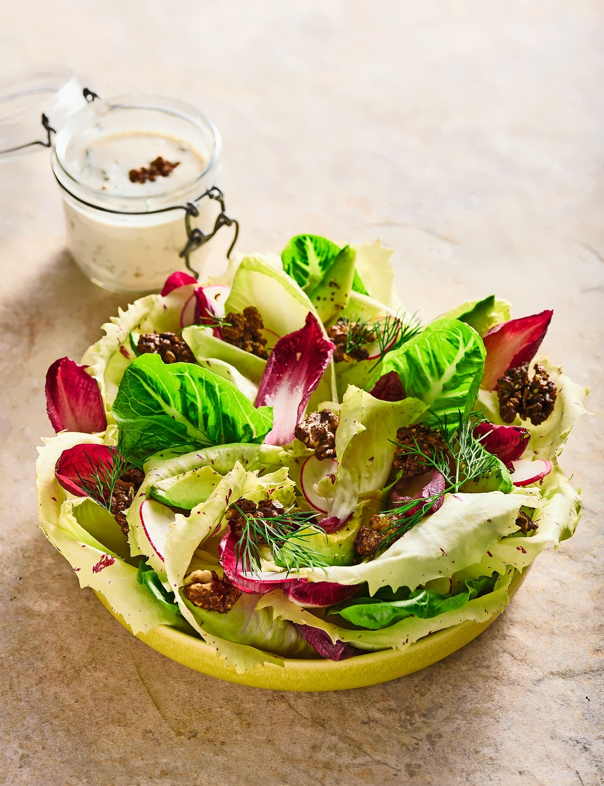 Castel Franco radicchio walnut salad with dressing.