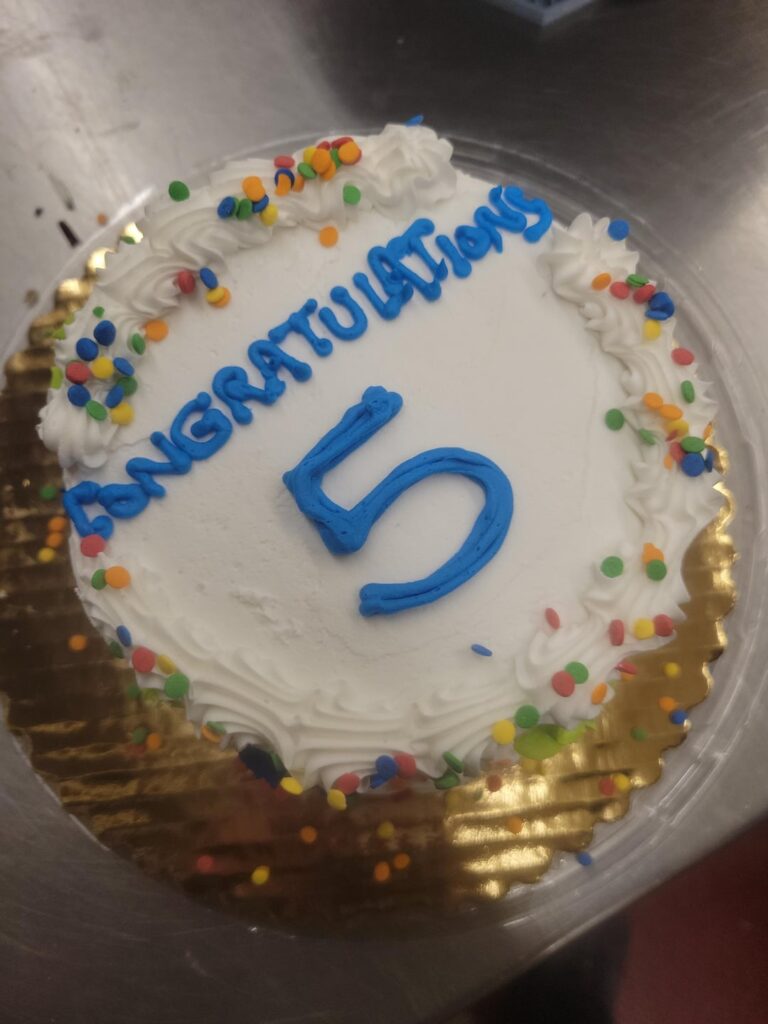 I finally managed to write "congratulations" on a five inch cake and I am more proud of it than I should be!
