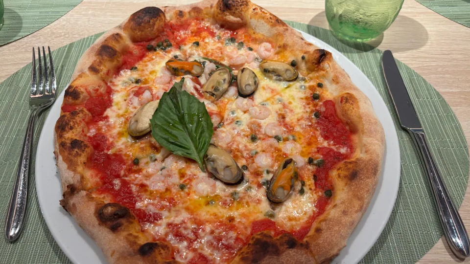 Pizza Tarantina, featuring mussels and bay shrimp, from Alfredo's Pizzeria on Princess Cruises' Star Princess.Gabriela Arevalo