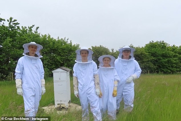 Cruz also shared this picture of himself and his siblings in beekeeping attire - a pastime they would take part in with father David (L-R Romeo, Cruz, Harper, Brooklyn)