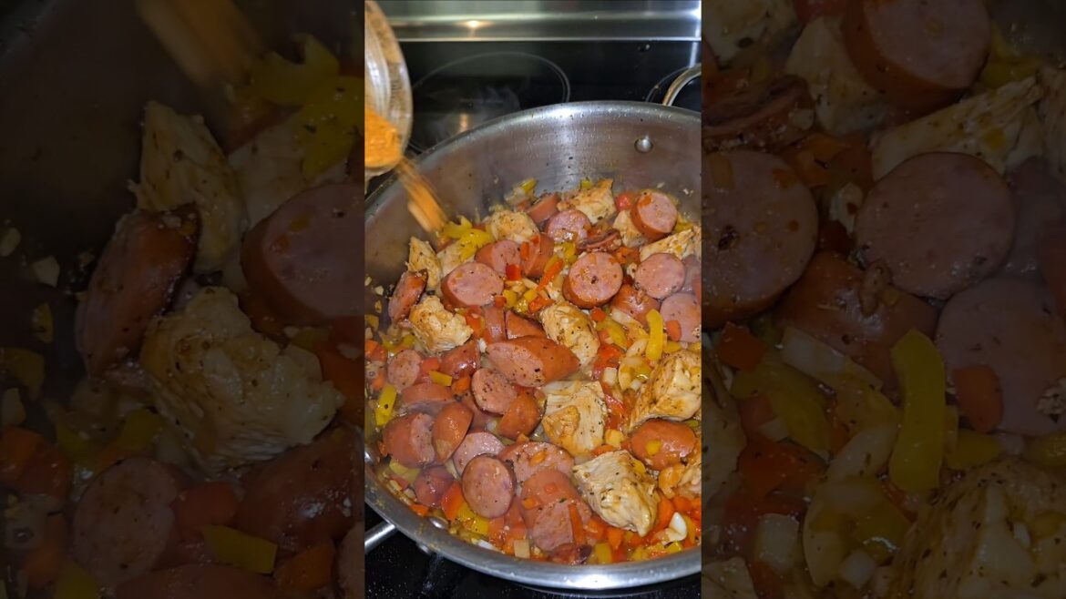 The best chicken and sausage jambalaya in a stainless steel pan