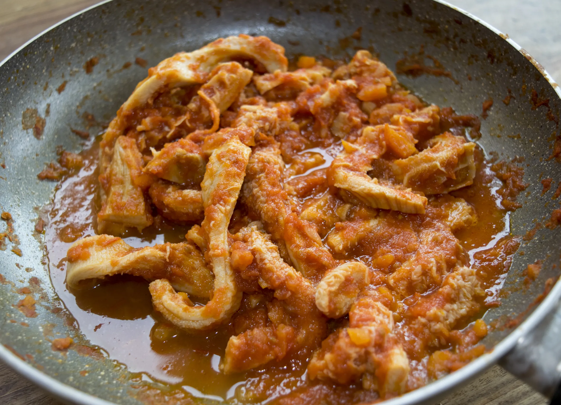 Roman-style tripe in a pan.
