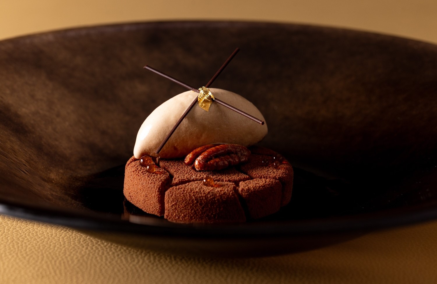 A sumptuous dessert of pecan praline with Pedro Ximénez, coffee and cocoa nib. © Bonheur by Matt Abé