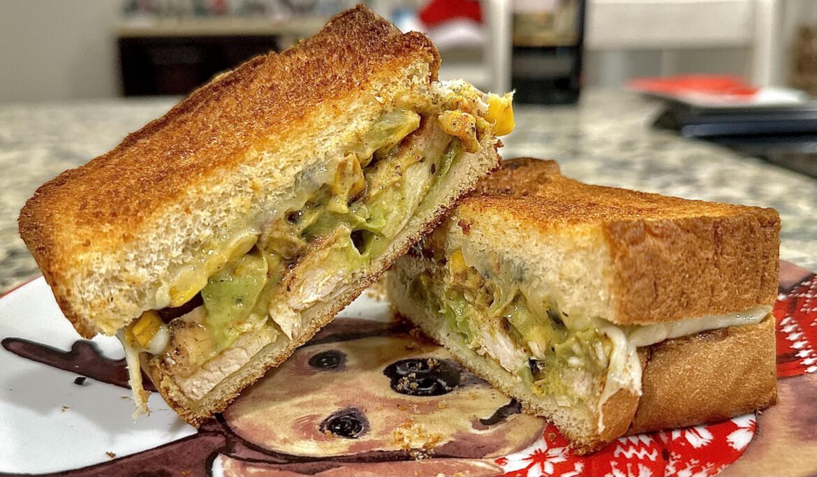 Mexican Inspired “Grilled Cheese” with Pollo Asado, Habanero Monterey Jack Cheese, Guac and Roasted Pablano Elote