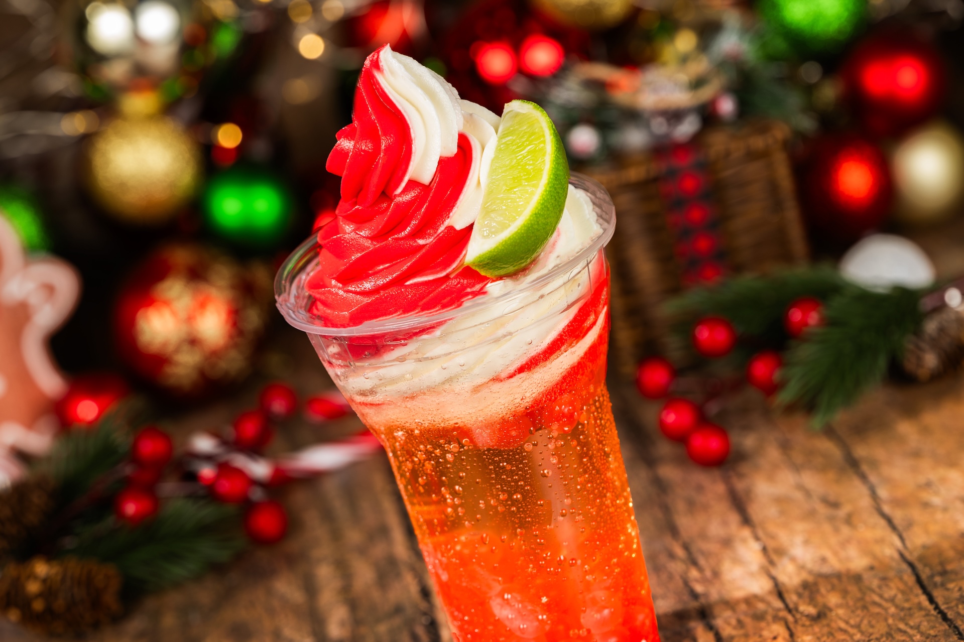 Pomegranate Yule Float: Ginger ale with DOLE Whip Pomegranate and vanilla soft-serve, pomegranate boba pearls, and a slice of lime