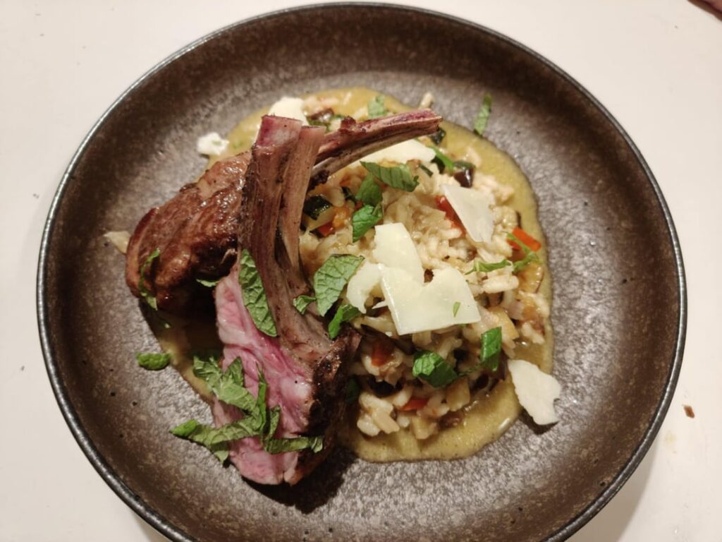 Rack of lamb, aubergine & lemon risotto, thick pecorino romano shavings and fresh min