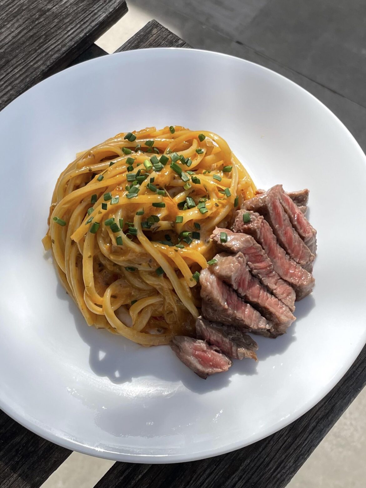 [homemade] caramelized onion and garlic confit gochujang linguine + denver steak